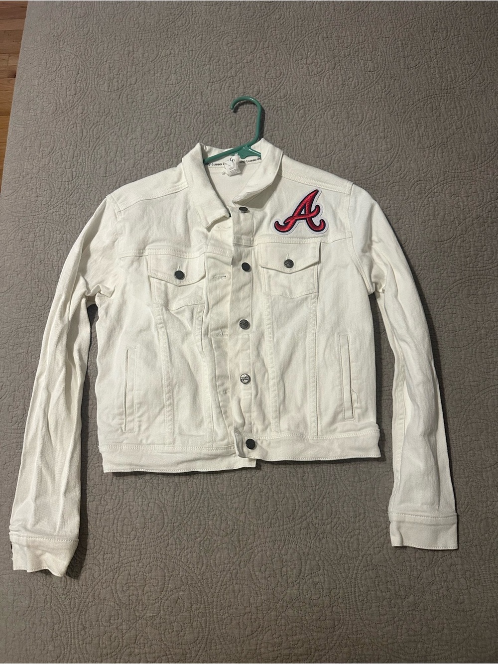 Women’s White Denim Jacket from Atlanta Braves Clubhouse Store with Red A Patch